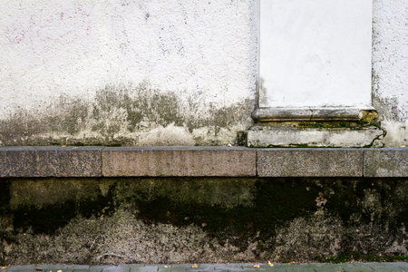 Old plastered weathered street wall background. Architectural detail.の写真素材