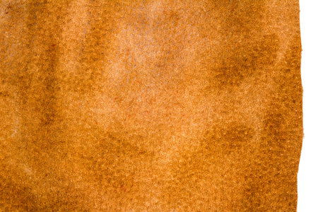 Piece of brown leather isolated on white backgroundの写真素材