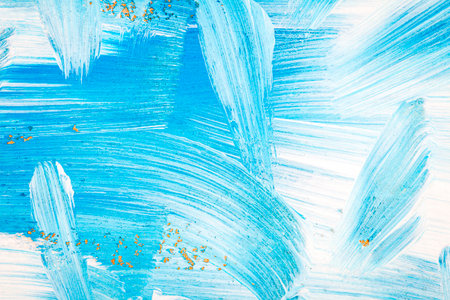 Blue and white abstract art painting on a brown cardboard. Creative abstract hand painted...