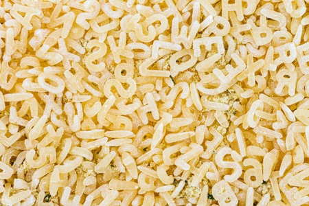 Texture of raw alphabet abc letter pasta.の写真素材