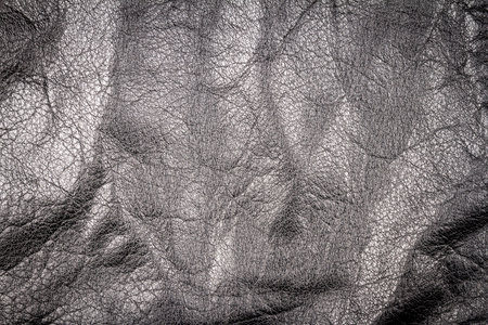 Crumpled black leather texture background. Abstract texture of leather.の写真素材