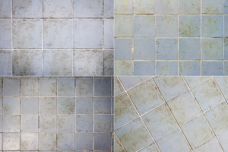 Collection of images with weathered gray tile wall textures backgroundsの写真素材