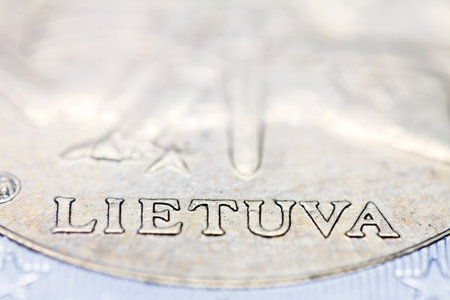 Two euro coin macro detail with Lietuva word. Lithuanian 2 euro coin macro view. European currency extreme close up. Shallow depth of field.の写真素材