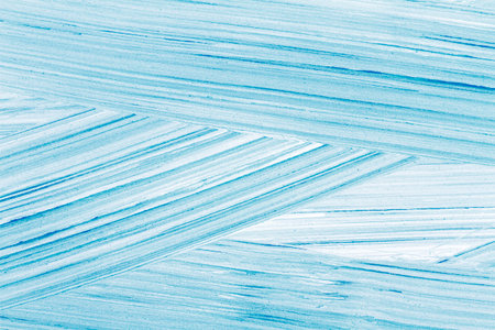 Abstract hand drawn blue acrylic paints background. Brushed texture close up.の写真素材