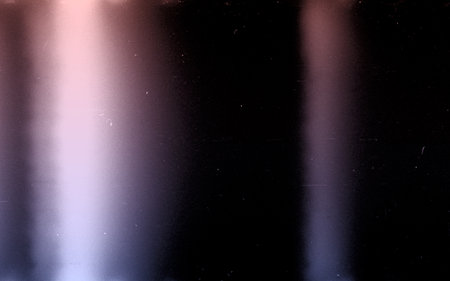 Blank toned film strip texture background with heavy grain, dust and light leaks