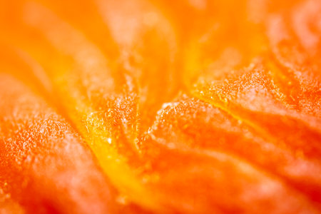 Extreme close up of dried orange apricot texture. Selective focus.の写真素材