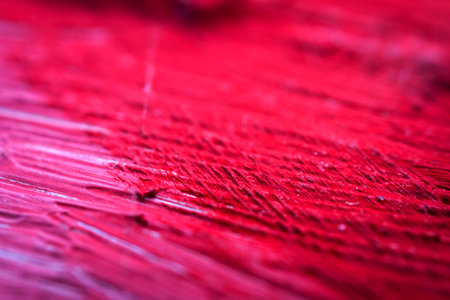 Extreme close up of colorful acrylic paint texture showing brush strokes. Selective focus.の写真素材