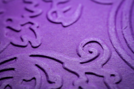 Extreme macro of embossed purple paper. Selective focus, shallow depth of field.の写真素材