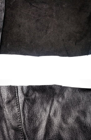 Two pieces of black leather with a space for text isolated on white background.の写真素材