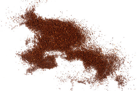 Pile of fresh ground coffee isolated on white backgroundの写真素材
