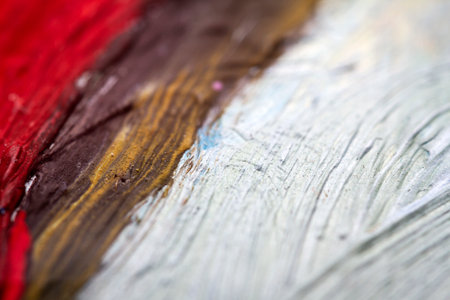 Extreme close up of colorful acrylic paint texture showing brush strokes. Selective focus.の写真素材