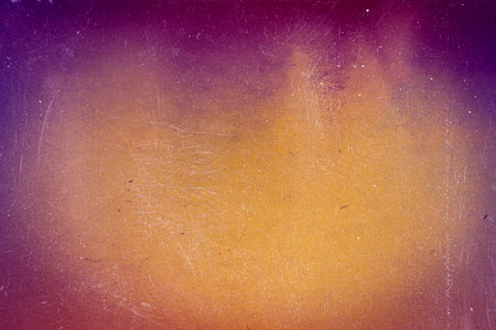 Abstract colorful scratched film texture background with heavy grain, dust and light leak