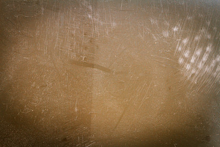Blank grained toned film strip texture background with heavy grain and dust