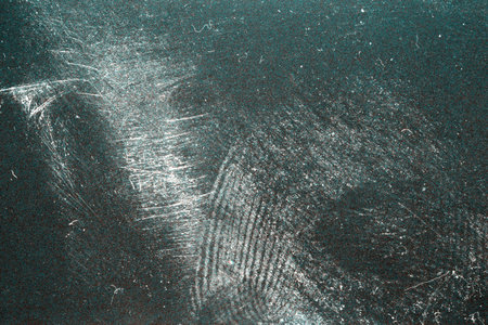 Blank grained toned film strip texture background with heavy grain, dust and light leak