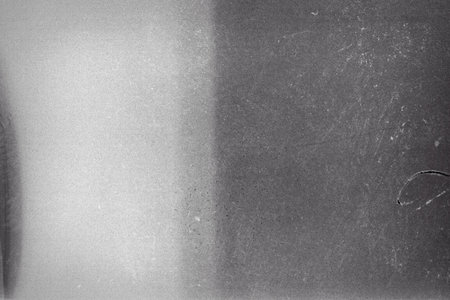 Blank grained film strip texture background with heavy grain and dustの写真素材