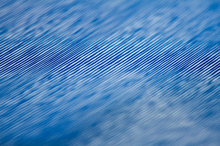 Macro shot of blue vinyl record. Surface of an old vinyl record. Shallow deph of field.の写真素材