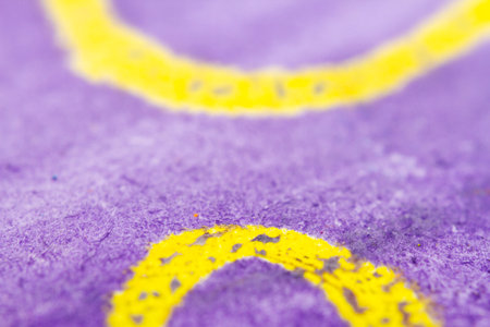 Extreme close up of purple watercolor on paper texture Selective focus. Shallow depth of field.の写真素材