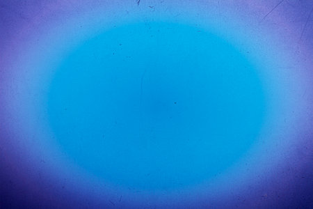 Blank grained toned film strip texture background with heavy grain, dust and light leakの写真素材