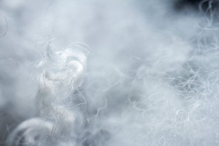 Extreme macro of polyester stable fiber. Selective focus, shallow depth of field.