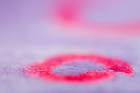 Extreme close up of purple watercolor on paper texture Selective focus. Shallow depth of field.