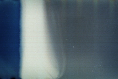 Abstract film texture background with grain, dust and light leak