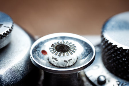 Macro of retro photo camera detail. Selective focus. Shallow depth of field.の写真素材