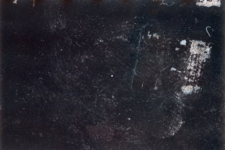 Blank grained film strip texture background with heavy grain and dustの写真素材