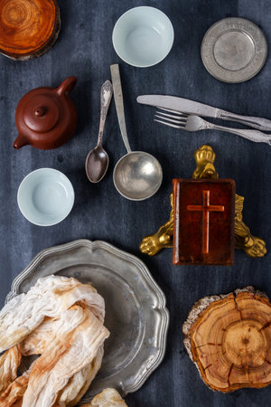 Various antique vintage dishes on black chalkboard background. Flat lay. Top view. Food concept....