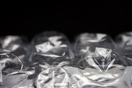 Extreme macro of plastic bubble wrap texture. Selective soft focus, shallow depth of field. Abstract...