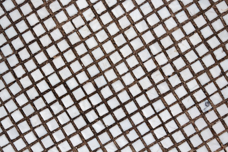 Texture of the old tile wall. Square white small tiles on concrete textureの写真素材