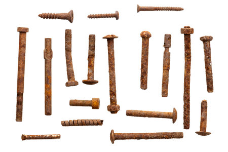 Collection of rusty bolts, screws, and nuts isolated on a white background. Design elements. Metal...
