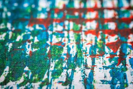 Extreme close up of colorful acrylic paint texture showing brush strokes. Selective focus.の写真素材