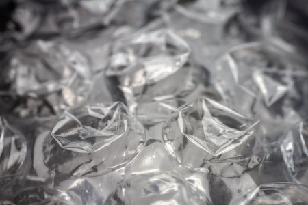 Extreme macro of plastic bubble wrap texture. Selective soft focus, shallow depth of field. Abstract...