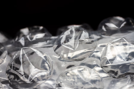 Extreme macro of plastic bubble wrap texture. Selective soft focus, shallow depth of field. Abstract...