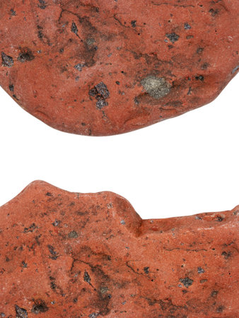 Edges of two pebbles isolated on white background with a space for text