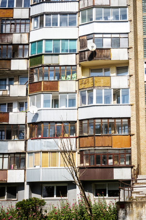 Soviet era architecture style of living district in Vilnius, Lithuania. Post-soviet urban architecture. Wall with windows and balconies.の写真素材