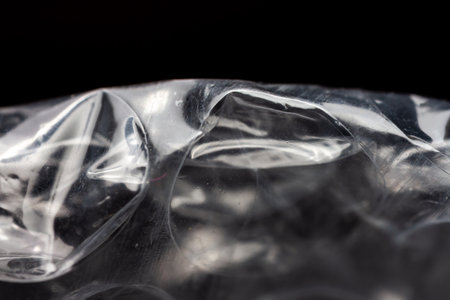 Extreme macro of plastic bubble wrap texture. Selective soft focus, shallow depth of field. Abstract dreamy backgroundの写真素材