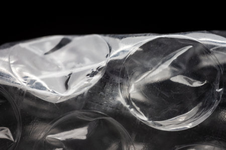 Extreme macro of plastic bubble wrap texture. Selective soft focus, shallow depth of field. Abstract...