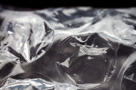 Extreme macro of plastic bubble wrap texture. Selective soft focus, shallow depth of field. Abstract...