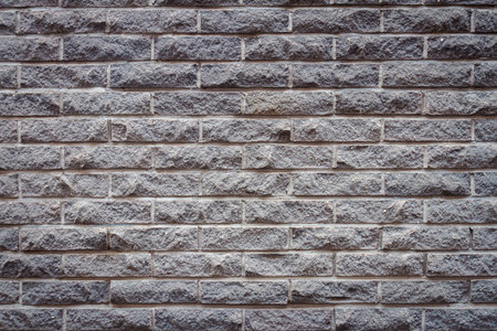 Background of old gray distressed brick wall texture, abstract architecture wallpaper.の写真素材