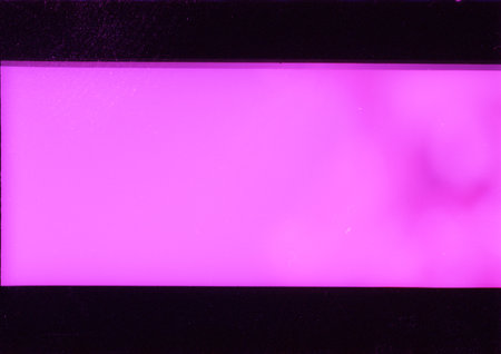 Blank grained film strip texture background with heavy grain and dustの写真素材