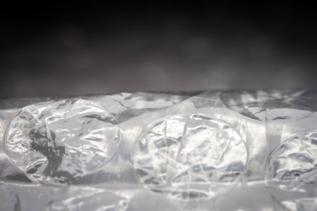 Extreme macro of plastic bubble wrap texture. Selective soft focus, shallow depth of field. Abstract...