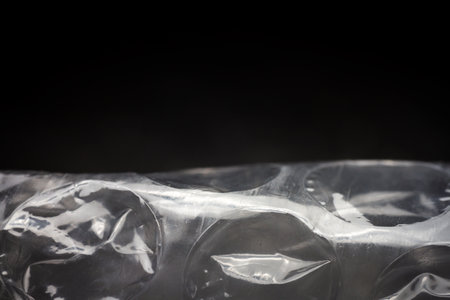 Extreme macro of plastic bubble wrap texture. Selective soft focus, shallow depth of field. Abstract...