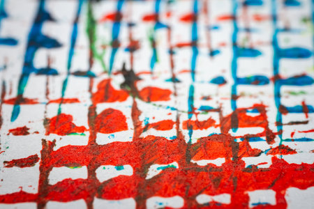 Extreme close up of colorful acrylic paint texture showing brush strokes. Selective focus.