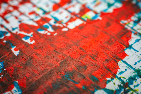 Extreme close up of colorful acrylic paint texture showing brush strokes. Selective focus.