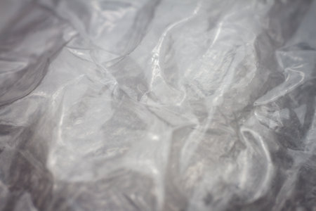 Extreme macro of plastic bubble wrap texture. Selective soft focus, shallow depth of field. Abstract dreamy backgroundの写真素材