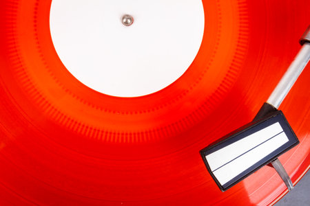 Close up of turntable needle on a vinyl record.の写真素材