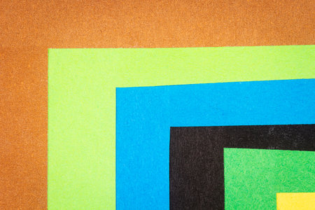 Multi color background from a paper of different colors. Abstract colorful vibrant textures paper.の写真素材