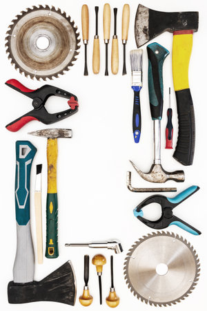 Flat lay of new and used hand tools on white background. Large collection of various tools and bits...
