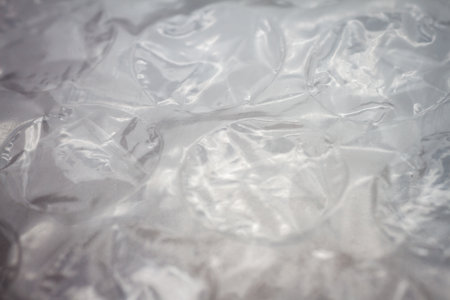 Extreme macro of plastic bubble wrap texture. Selective soft focus, shallow depth of field. Abstract...